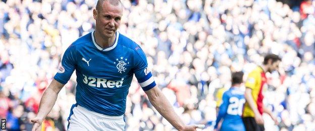 Kenny Miller celebrates