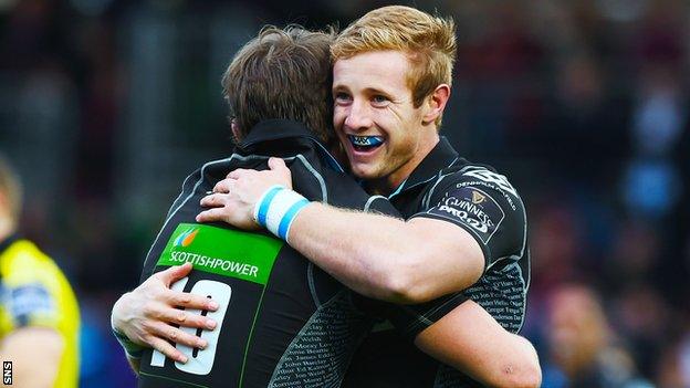 Brandon Thomson (right) celebrates a Glasgow Warriors try