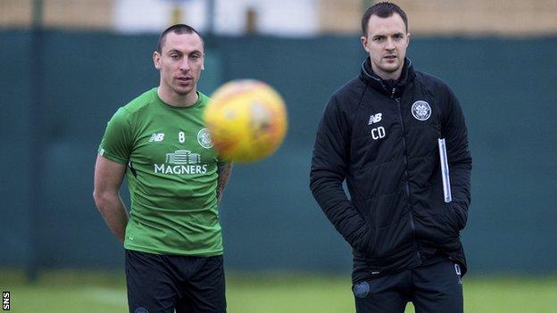 Celtic captain Scott Brown and assistant manager Chris Davies