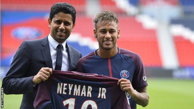 Neymar pictured with Paris St-Germain president Nasser Al-Khelaifi after completing his 220m euro move