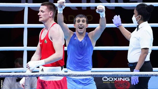 Javid Chalabiyev celebrates his victory over Ireland's George Bates