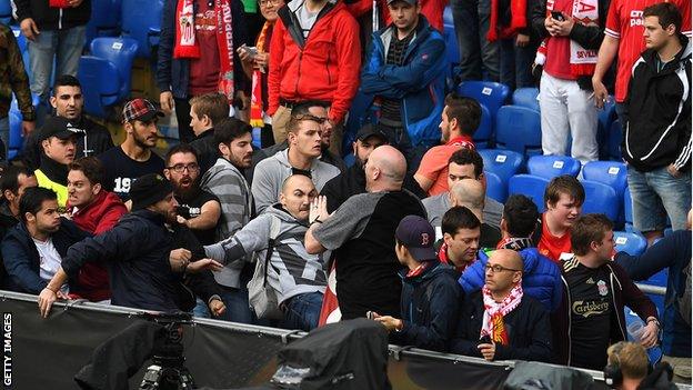 Liverpool and Sevilla fans clash