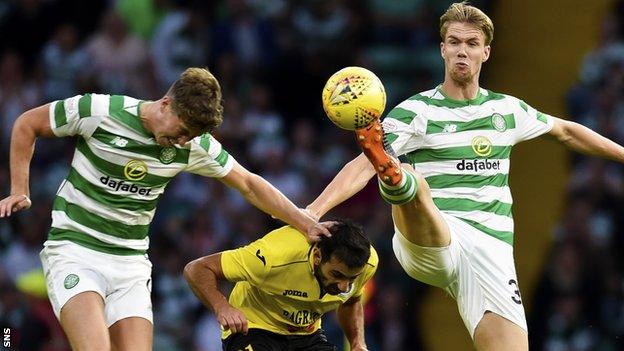 Celtic's Kristoffer Ajer tips the ball past team mate Jack Hendry and Alashkert's Artak Grigoryan