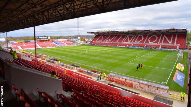 Richie Wellens' Swindon Town side are 11th in League Two, six points off the play-off places