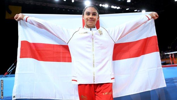 Ondine Achampong holds England flag