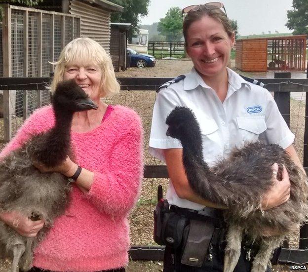 Anne-Marie Kirby with Mathilda and RSPCA inspector Jane Folly with Monty