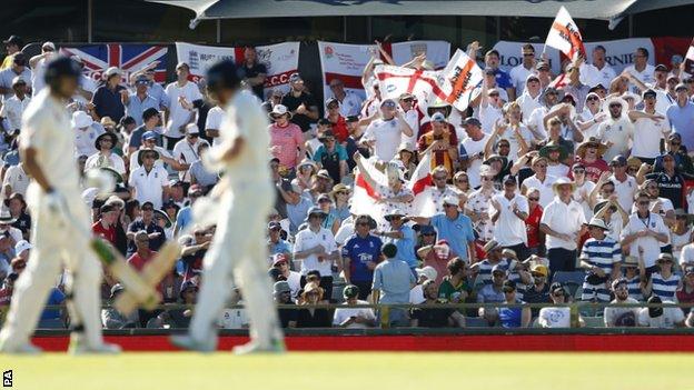 Travelling supporters cheer on England during the third Test in Perth