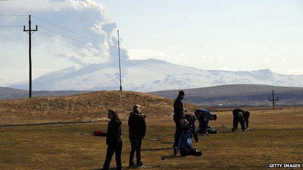 people playing golf