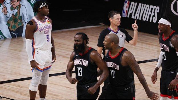 James Harden celebrates after blocking Luguentz Dort 's attempted three-pointer in the final seconds