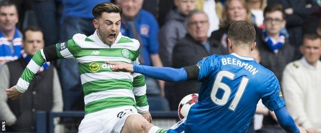 Celtic's Patrick Roberts is tackled by Rangers' Myles Beerman