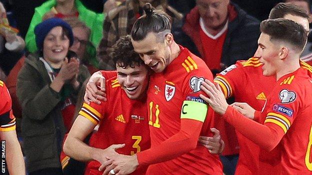 Gareth Bale and Harry Wilson help Neco Williams celebrate his goal