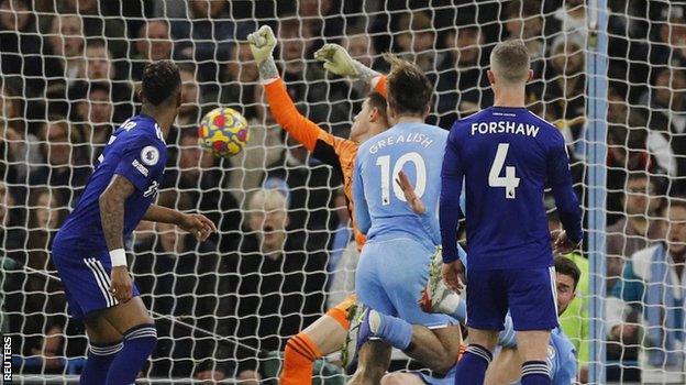 Jack Grealish heads home City's second goal