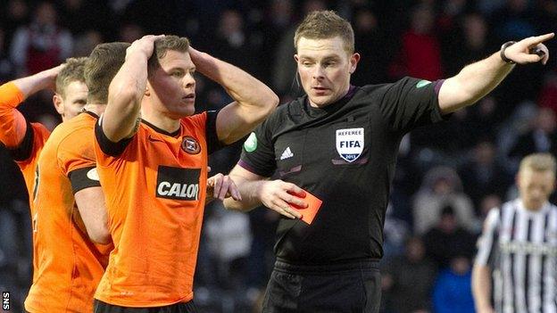 Dundee United's John Rankin is sent off by referee John Beaton in 2013