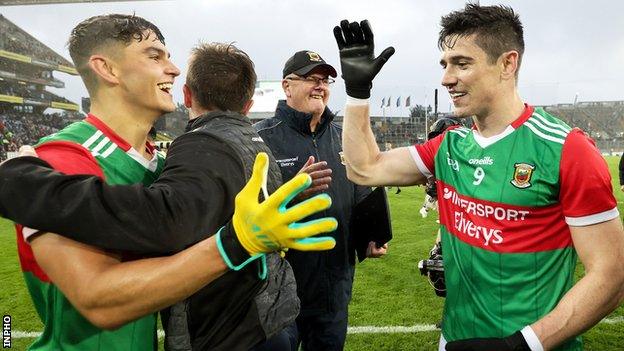 Conor Loftus (right) celebrates with Mayo team-mate Tommy Conroy after their semi-final victory over Dublin