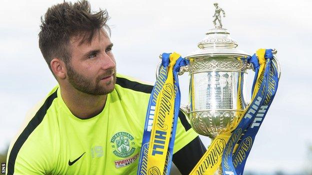 Hibs' James Keatings with the Scottish Cup