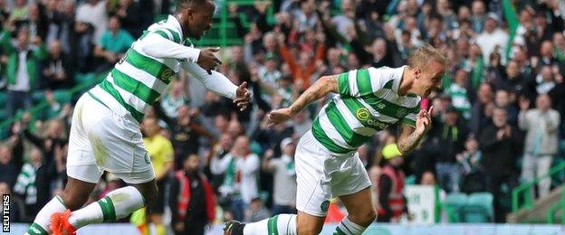 Leigh Griffiths wheels away after scoring Celtic's second goal