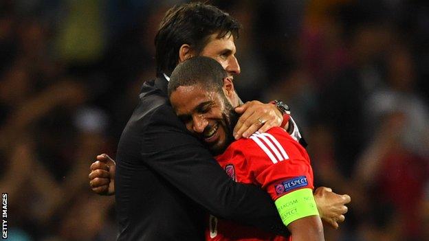 Chris Coleman hugs Ashley Williams