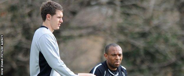 Aaron Ramsey (left) with Danny Gabbidon during Wales training in 2011