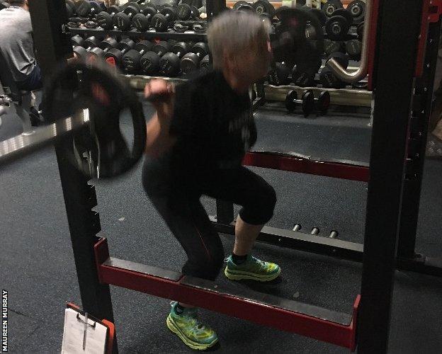 Maureen strengthens her legs and back with squats and deadlifts