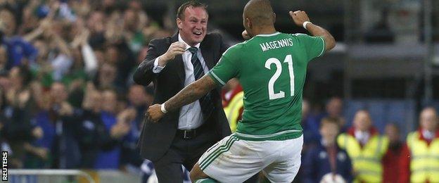 Josh Magennis celebrates