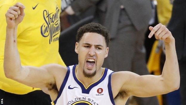 Klay Thompson celebrates