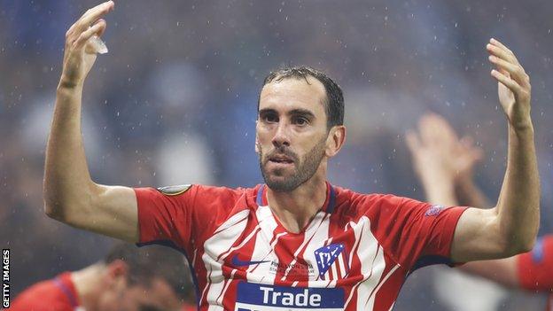 Diego Godin celebrates a victory for Atletico Madrid