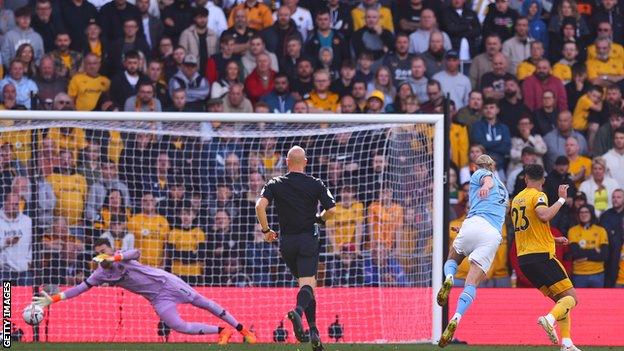 Erling Haaland scores for Manchester City against Wolves in the Premier League
