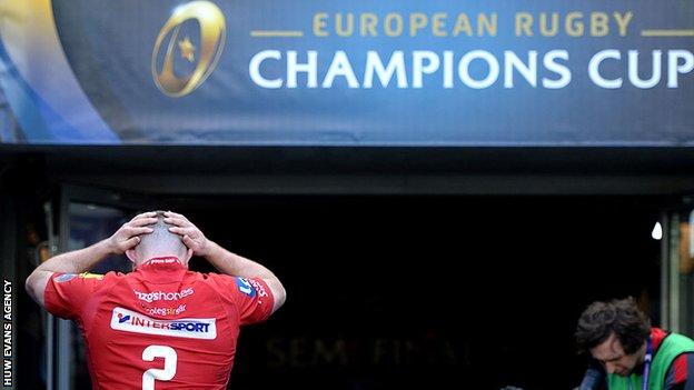 Ken Owens holds his head in his hands as he walks down the tunnel after Scarlets' heavy defeat by Leinster in the semi final of the 2017-18 European Champions Cup