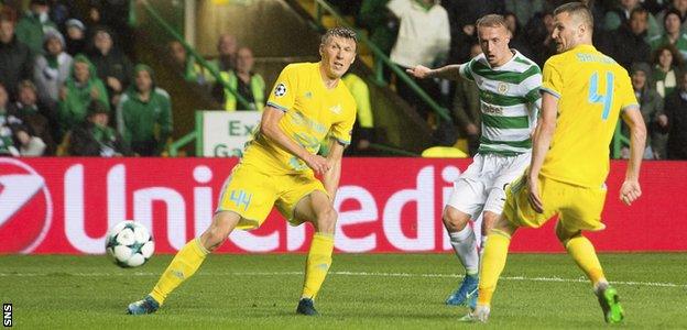 Leigh Griffiths knocks in Celtic's fifth goal, deflected into the net by Igor Shitov