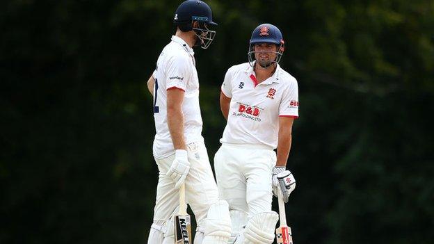 Essex openers Paul Walter and Sir Alastair Cook were parted immediately after the restart at Arundel