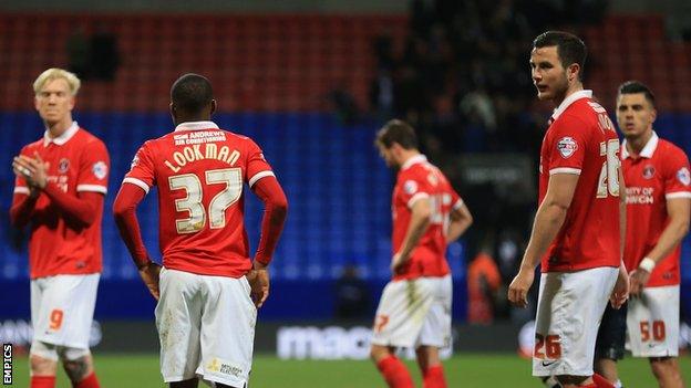 Charlton Athletic players look dejected following relegation