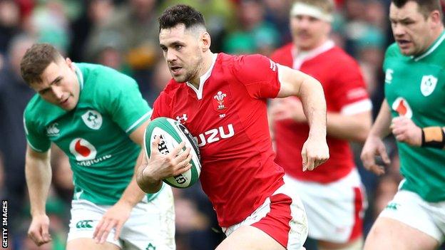 Tomos Williams bursts past Jordan Larmour and Cian Healy to score Wales' first-half try