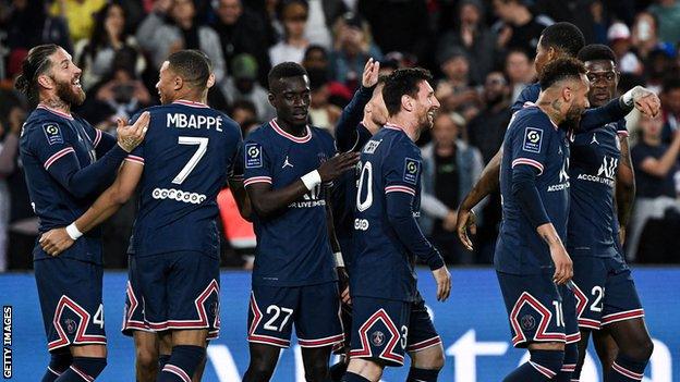 PSG players celebrate Lionel Messi's goal