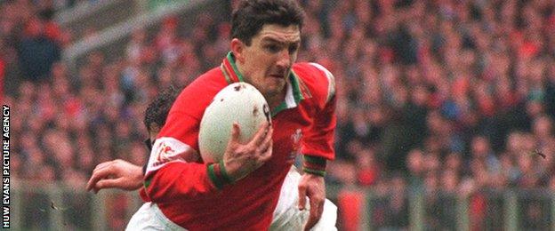 Robert Jones in action for Wales against England in 1995