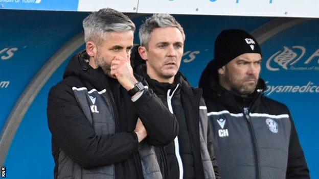 Maurice Ross (centre) in the Motherwell dugout