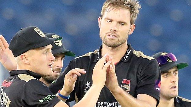 Mathew Pillans (right) is congratulated by Leicestershire team-mates after taking a wicket
