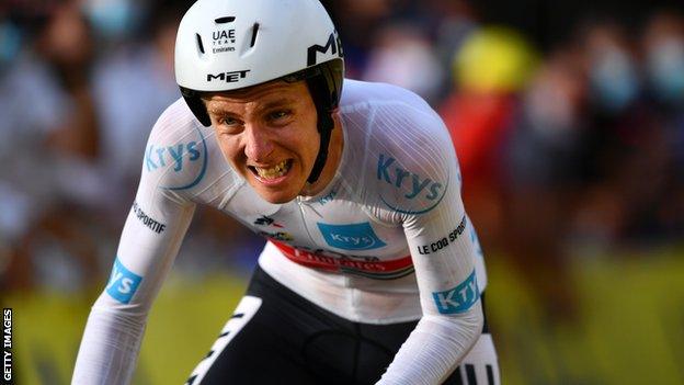 Tadej Pogacar grimaces as he wins stage 20 of the 2020 Tour de France