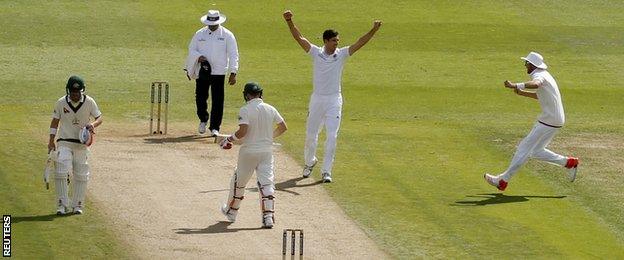 Steven Finn celebrates the wicket of Steve Smith