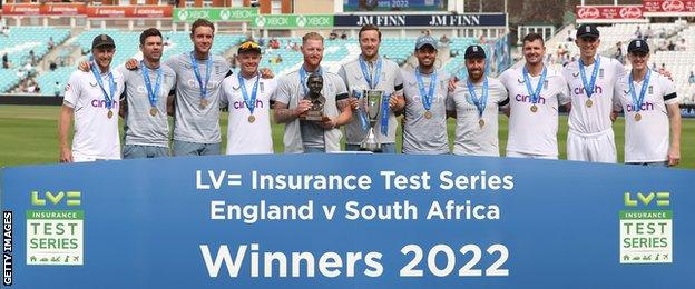 England players pose with the Test series trophy after beating South Africa