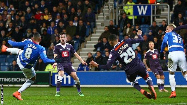 Tjaronn Chery scores with a first-half volley against Derby at Loftus Road