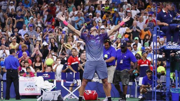 Juan Martin celebrates beating Dominic Thiem