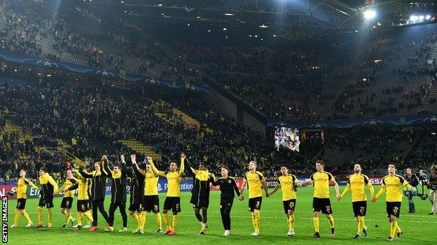 Borussia Dortmund celebrate making Champions League history