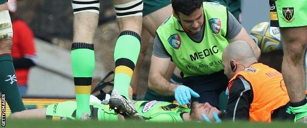 Stand-in Northampton captain Rob Horne receives medical attention at Welford Road