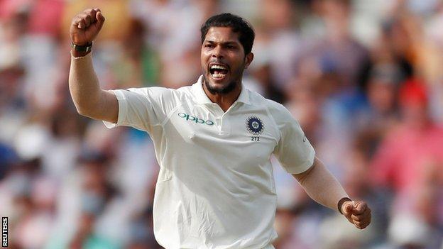 Umesh Yadav celebrates taking a wicket for India