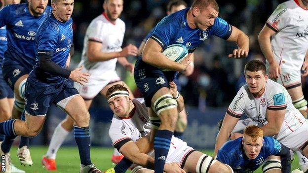 Marcus Rea tackles Leinster's Ross Moloney in the northern province's win at the RDS on 27 November