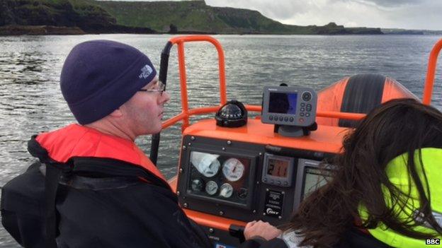 Gary Burrows driving the boat