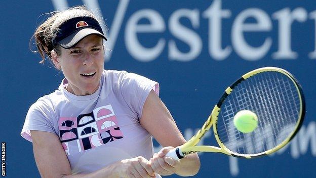 Johanna Konta hits a return at the Western and Southern Open in New York