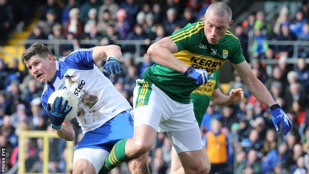 Kerry's Kieran Donaghy battles with Monaghan's Darren Hughes at Clones