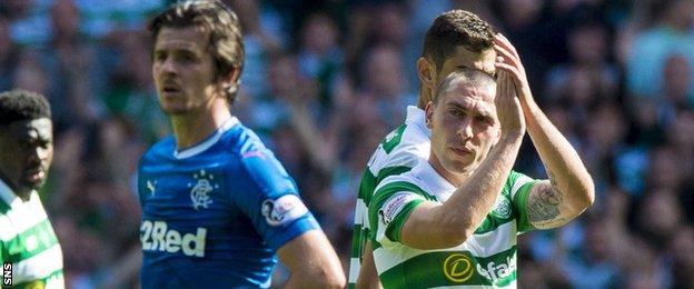 Rangers midfielder Joey Barton and Celtic's Scott Brown