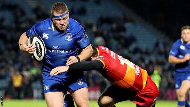 Leinster's Sean Cronin is tackled by Angus O'Brien of the Dragons